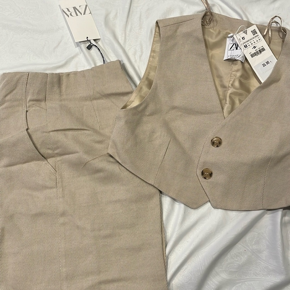 Two piece vest with flare leg pants
